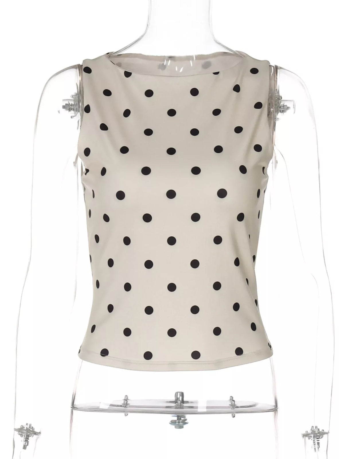 Polka dot tank top from Plush Fashion Hub, sleeveless tops with black and white polka dot pattern displayed on a hanger.