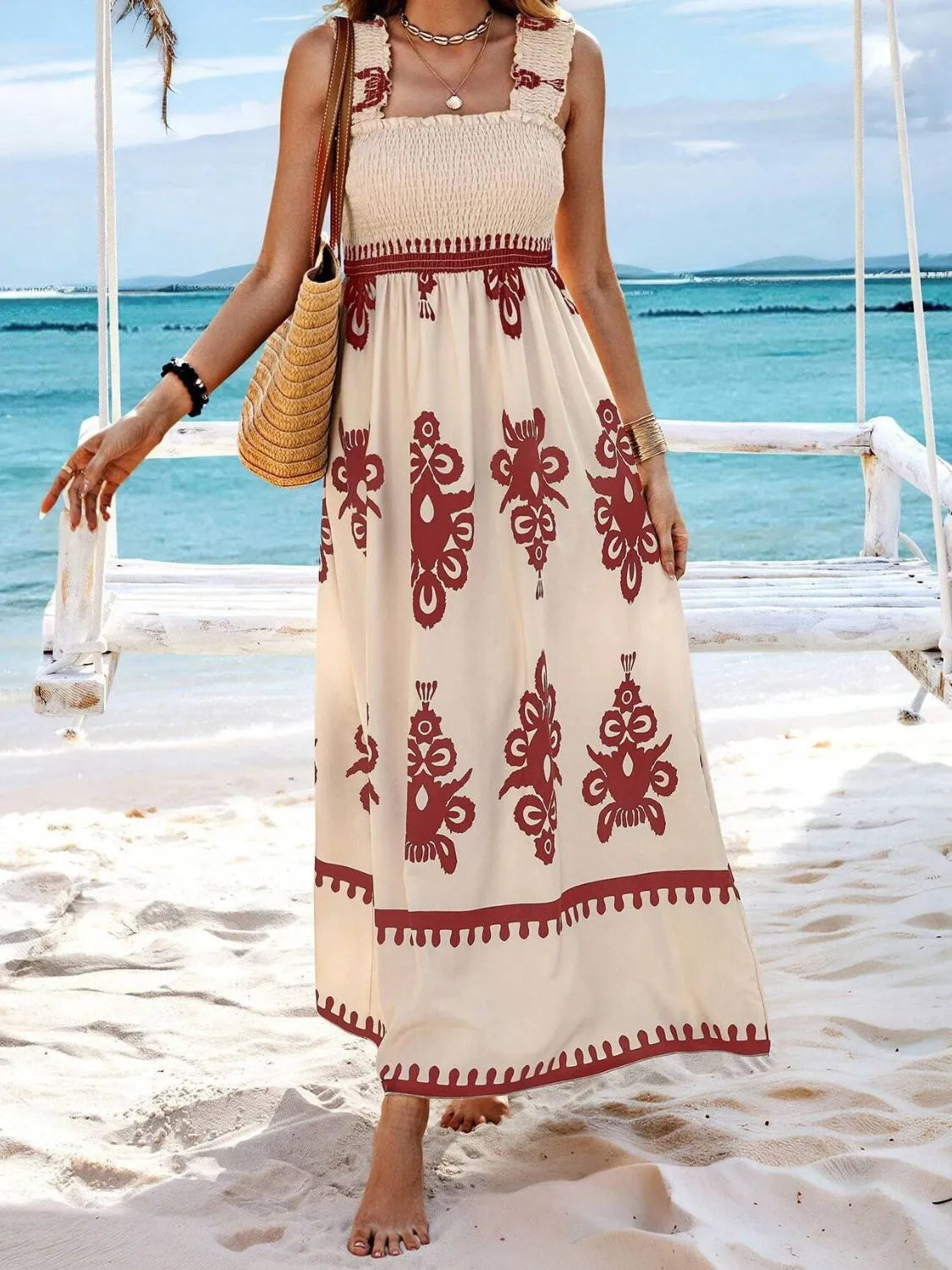 Plush Fashion Hub smocked printed wide strap maxi dress featuring a flowing silhouette and vibrant floral pattern.