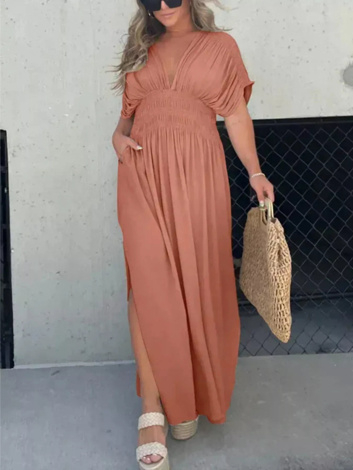 Plus size full slit V-neck maxi dress with smocked waist from Plush Fashion Hub, featuring a flowing fabric and elegant design.