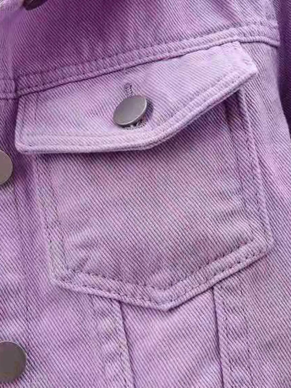 Plus size full-length cropped denim jacket from Trendsi, styled with classic blue denim and button-front closure.
