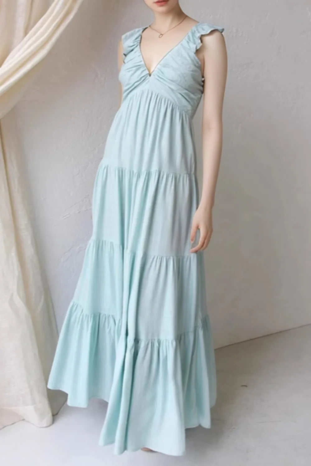 Women’s 100% cotton ruffled V-neck tiered midi dress by Plush Fashion Hub, featuring a flowy design and ruffled details.