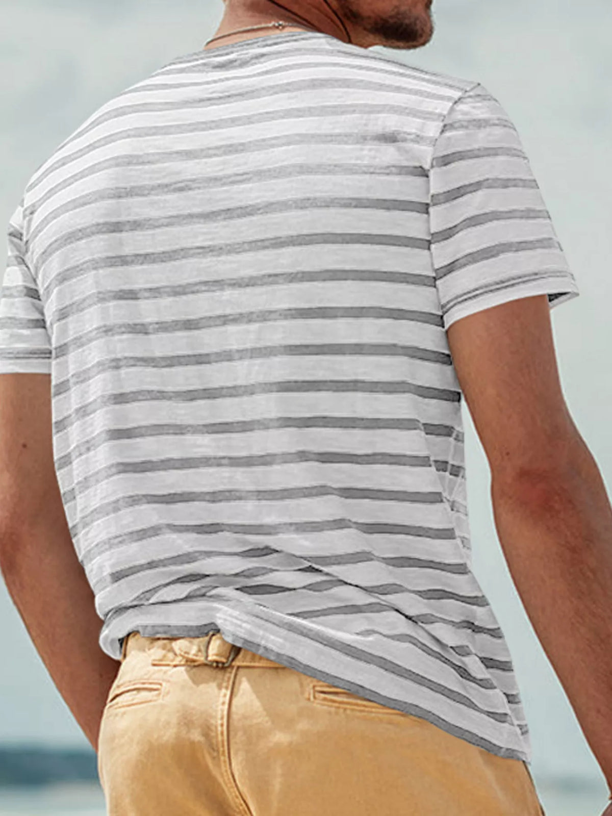 Plus size men's striped pocket short sleeve t-shirt by Plush Fashion Hub, showing front view with chest pocket detail.