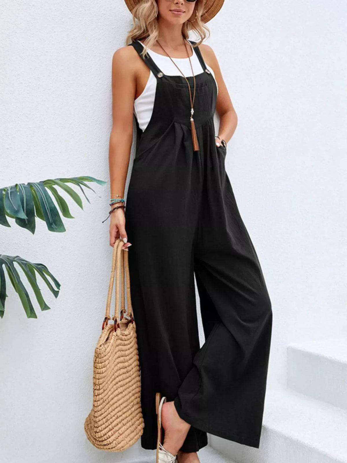 Plus size casual wide-leg jumpsuit with pockets from Plush Fashion Hub, featuring a full-length design and comfortable fit.