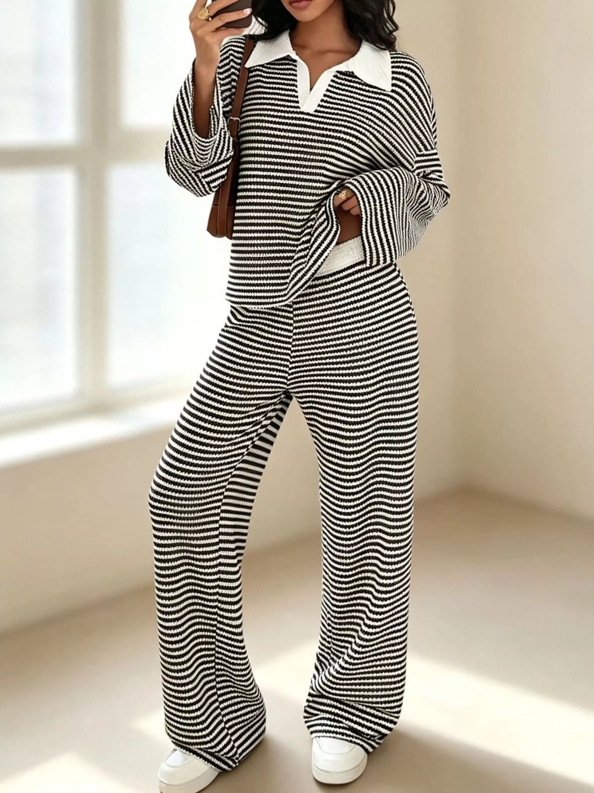 Striped long sleeve polo shirt and wide-leg pants set by Trendsi, featuring bold horizontal stripes and comfortable relaxed fit.