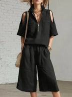 Casual two-piece set from Plush Fashion Hub with short-sleeve shirt and loose shorts, perfect for relaxed everyday wear.