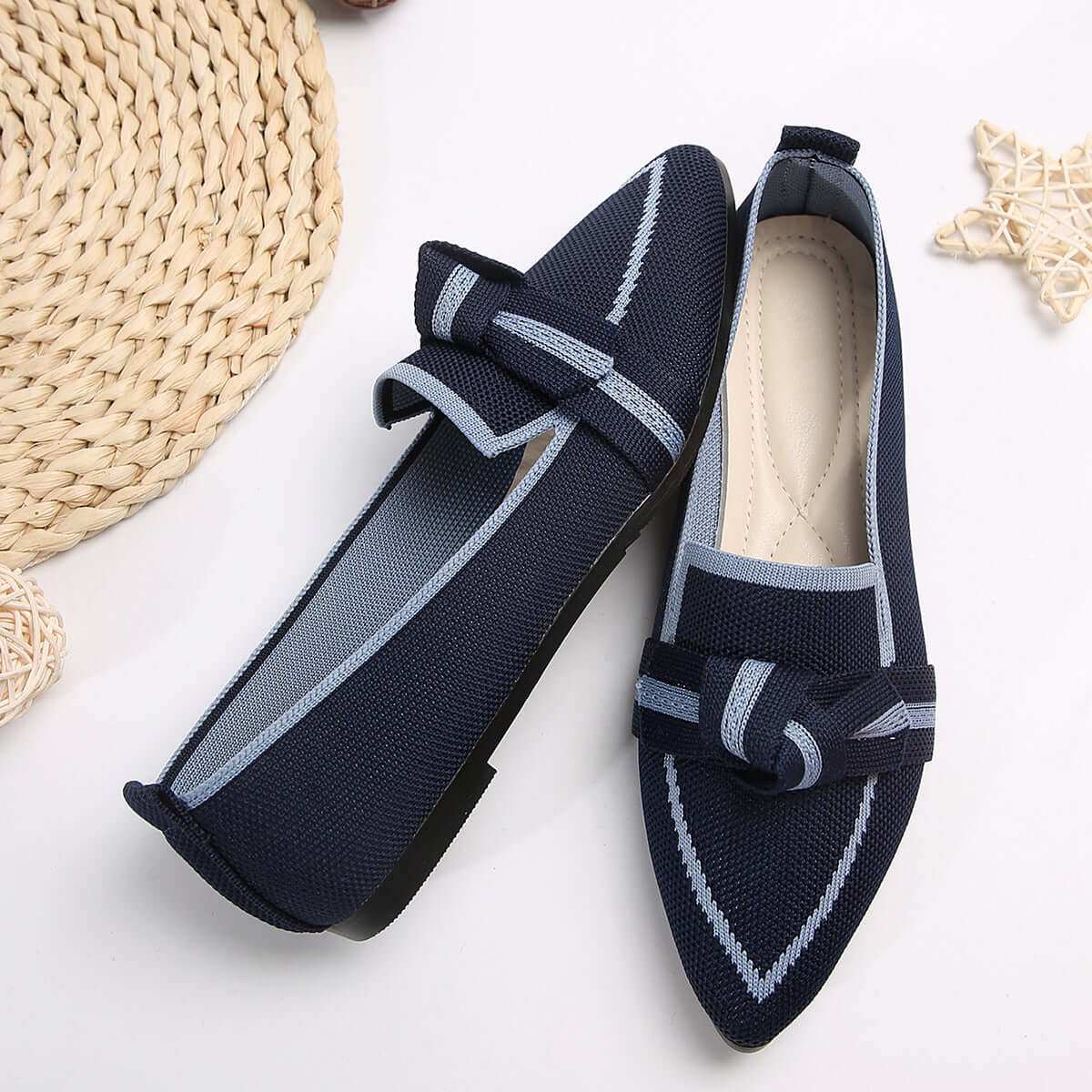 Bow Contrast Trim Point Toe Loafers with stylish bow and trim accents on a white background.