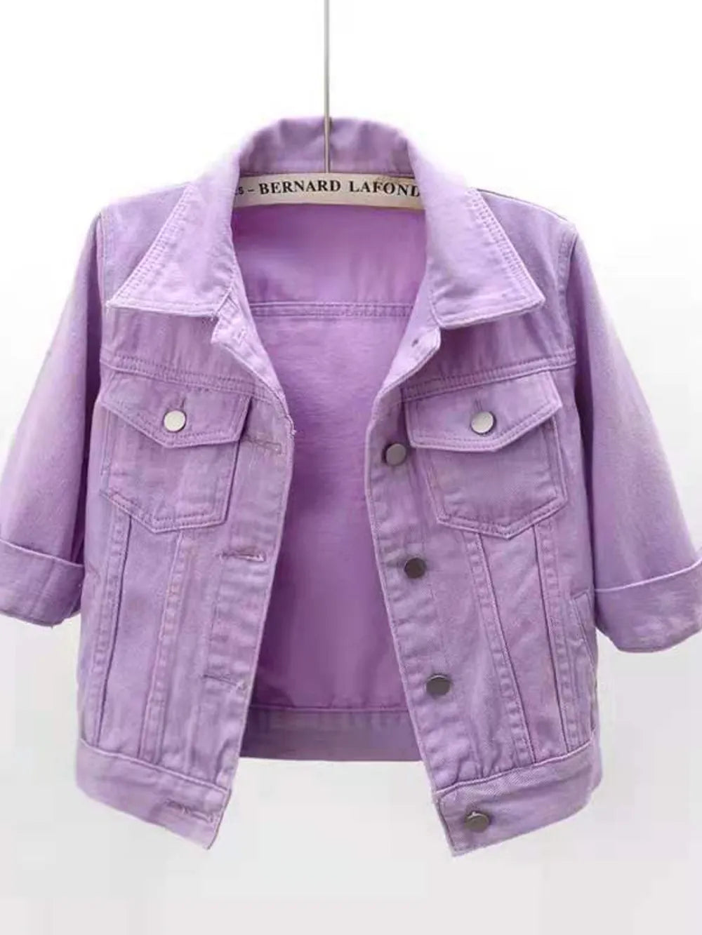 Plus size full-length cropped denim jacket from Trendsi, featuring classic denim fabric and a stylish fit.
