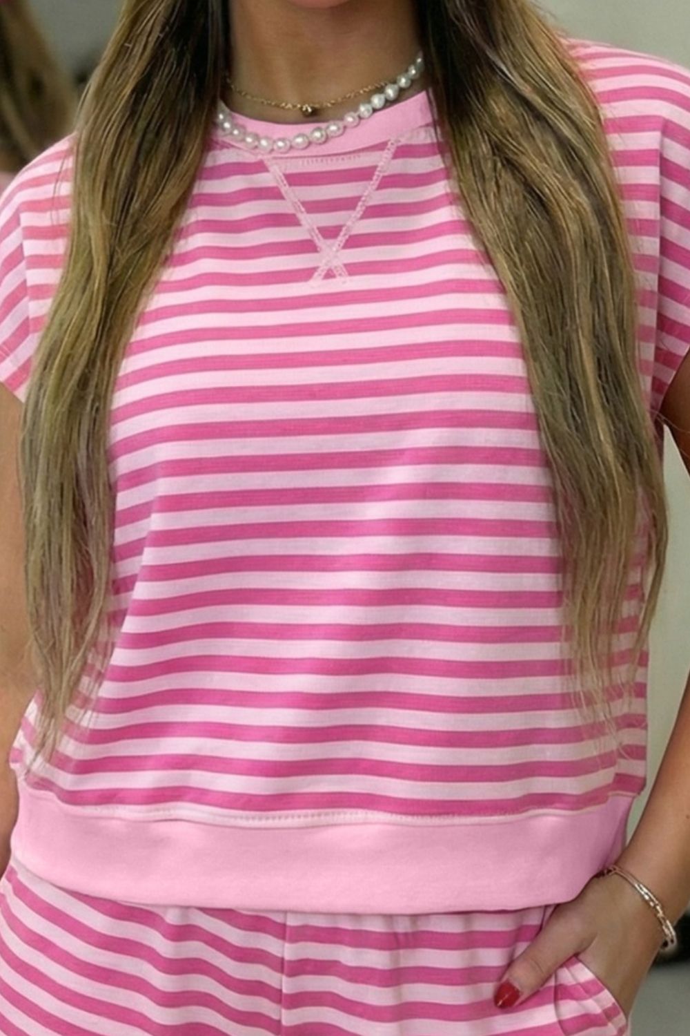 Women's casual striped two-piece cotton top and shorts set by Trendsi, featuring a relaxed fit and comfortable fabric.
