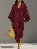 Women's loose casual shirt and cropped pants two-piece set by Plush Fashion Hub, featuring vintage-style relaxed fit.