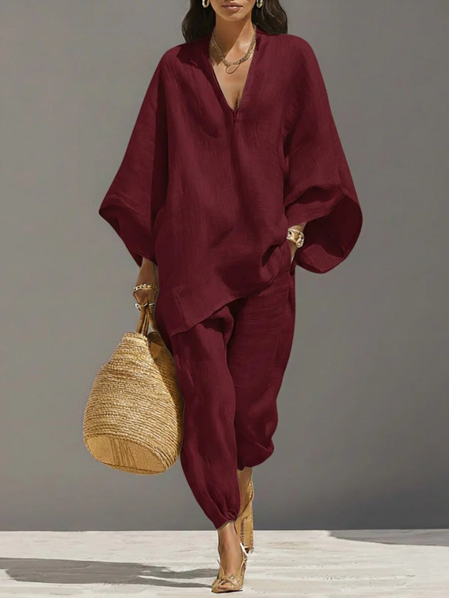 Women's loose casual shirt and cropped pants two-piece set by Plush Fashion Hub, featuring vintage-style relaxed fit.