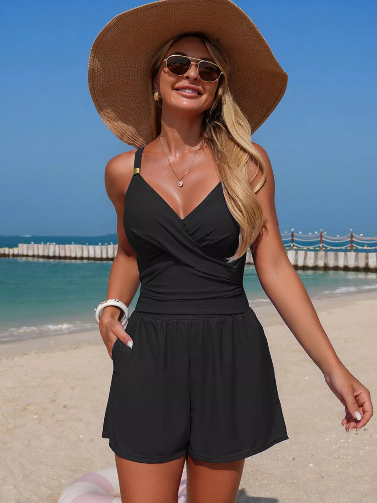 Women's V-neck spaghetti strap one-piece swimsuit by Plush Fashion Hub, stretchy beachwear with a flattering fit and vibrant design.