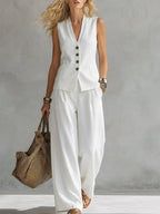 Women's solid linen sleeveless tank top and full-length pants set in casualwear style, shown in natural beige color.
