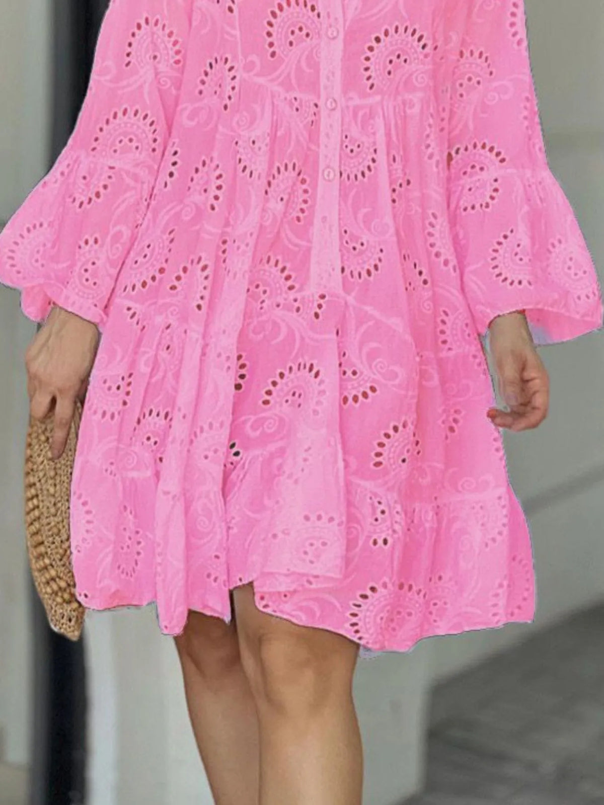 Plus size full-length eyelet ruffled hem tiered dress by Trendsi, showcasing a flowy, tiered design with eyelet details.