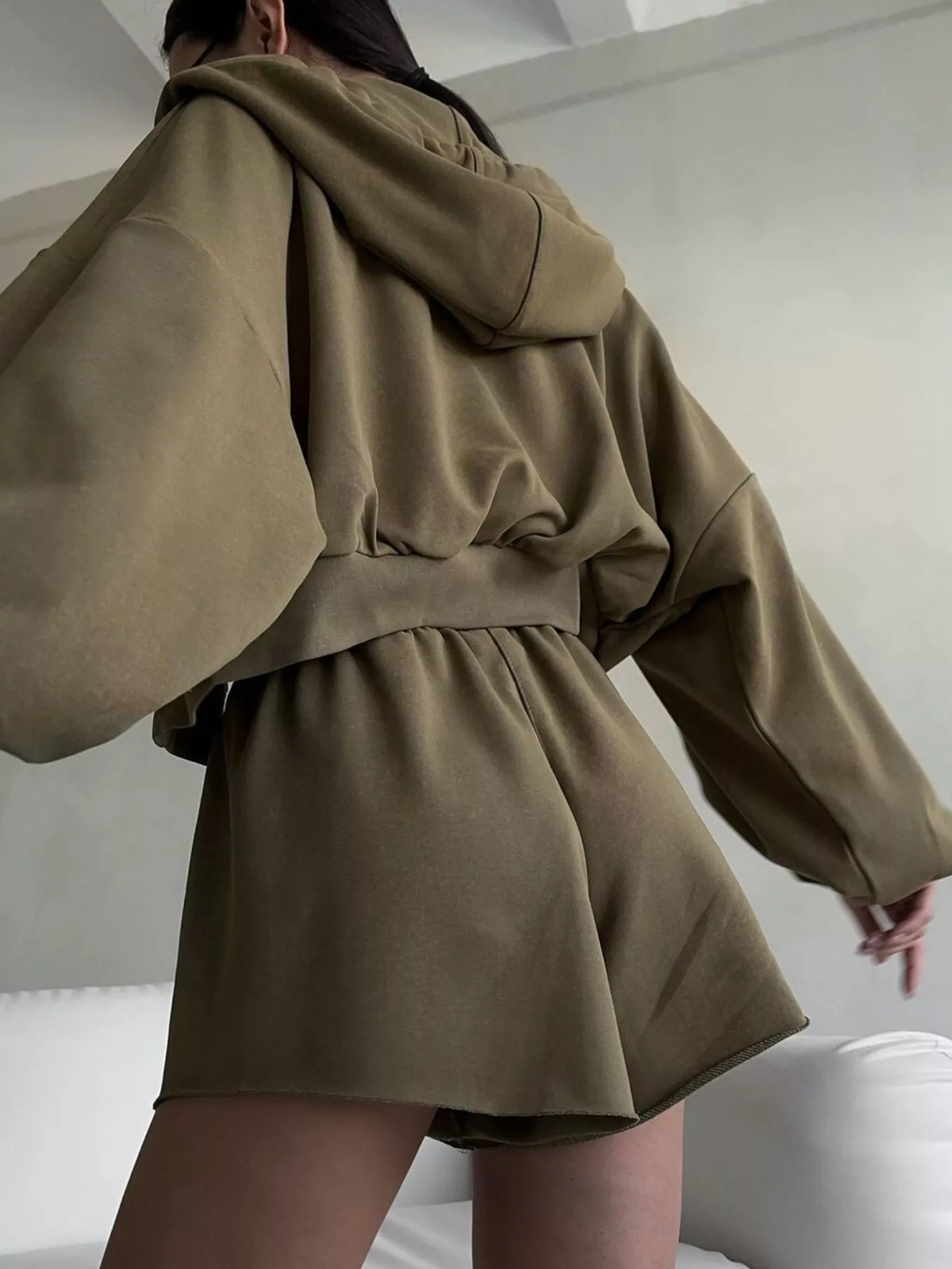Plush Fashion Hub zip-up long sleeve outerwear and matching shorts set, featuring comfortable fabric and casual style.