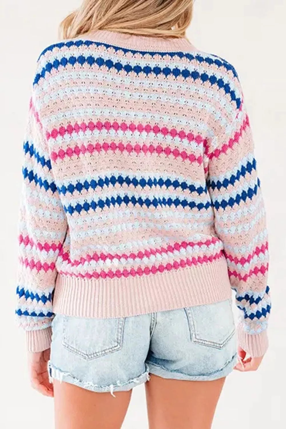 Women's striped geometric pattern sweater by Trendsi, featuring a stylish design with bold stripes and a cozy fit.