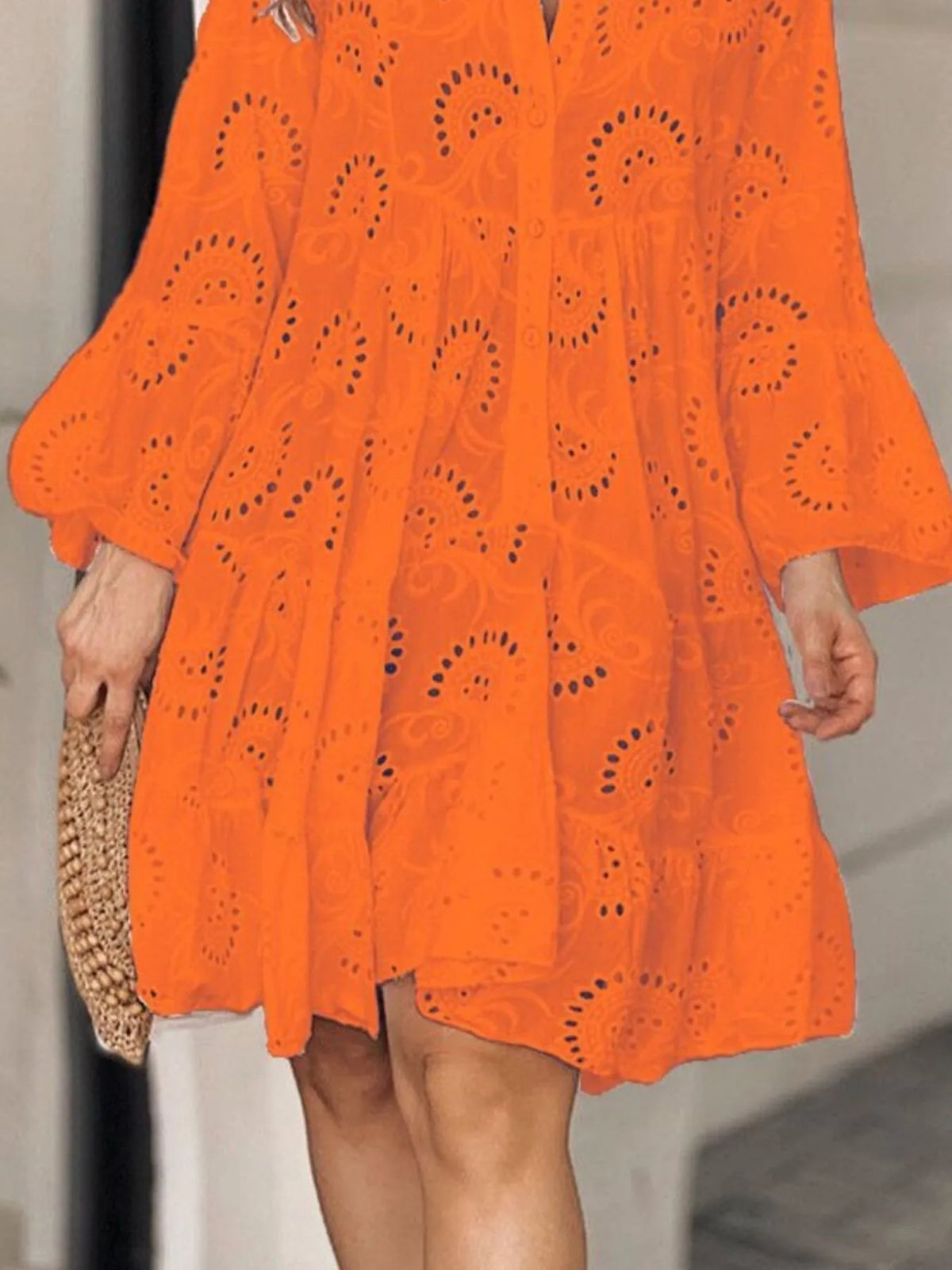 Plus size eyelet ruffled hem tiered dress by Trendsi, featuring a full-length design with feminine ruffle details and eyelet accents.