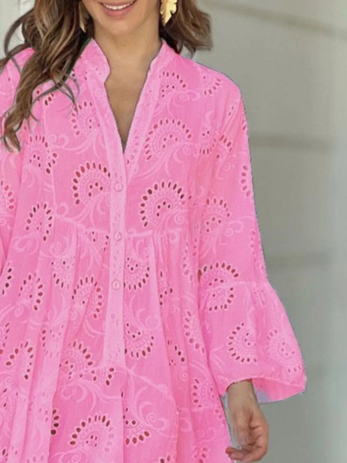 Plus size full length eyelet ruffled hem tiered dress by Trendsi, showcasing its flowing fabric and layered design.