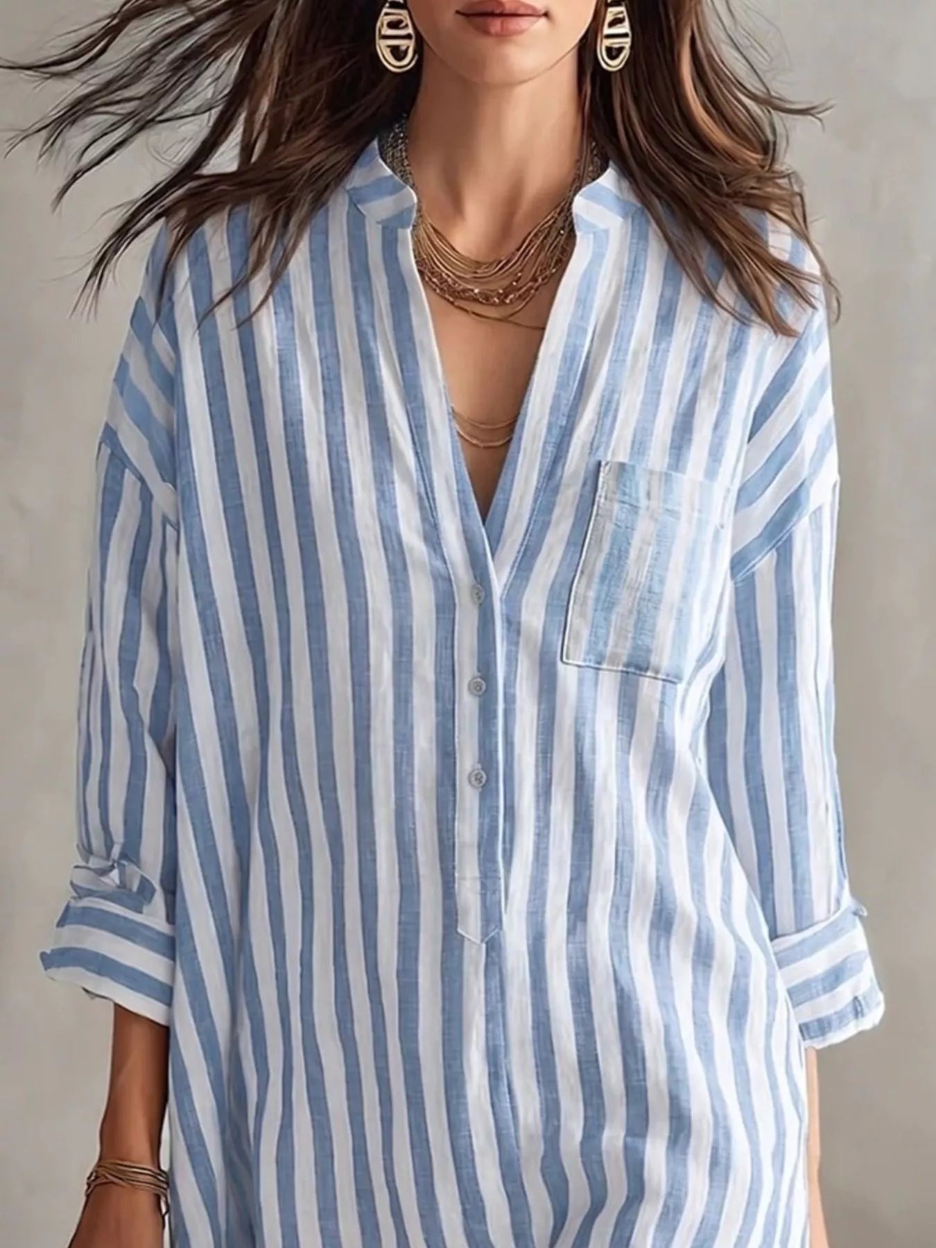 Plus size striped shirt dress with 3/4 sleeves from Trendsi, featuring a relaxed fit and casual style.