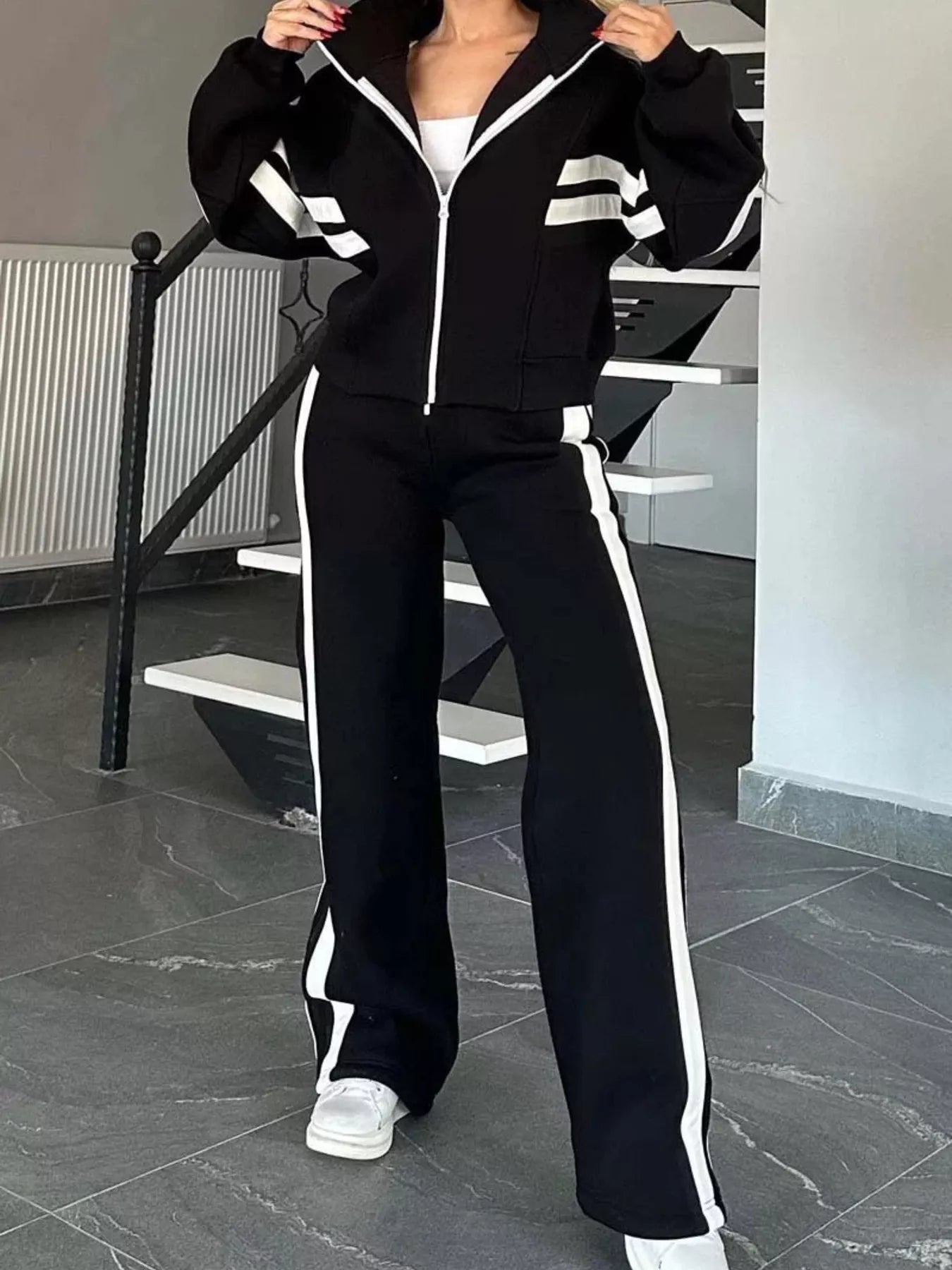 Plus size contrast stripe zip-up jacket and pants set by Plush Fashion Hub, activewear with bold black and white stripes.