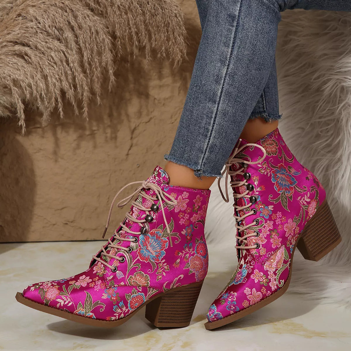 Point toe block heel boots from Trendsi featuring sleek footwear design with a stylish pointed toe and sturdy block heel.