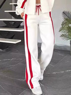 Plus size contrast stripe zip-up activewear jacket and pants set by Plush Fashion Hub, full size, sporty and comfortable.