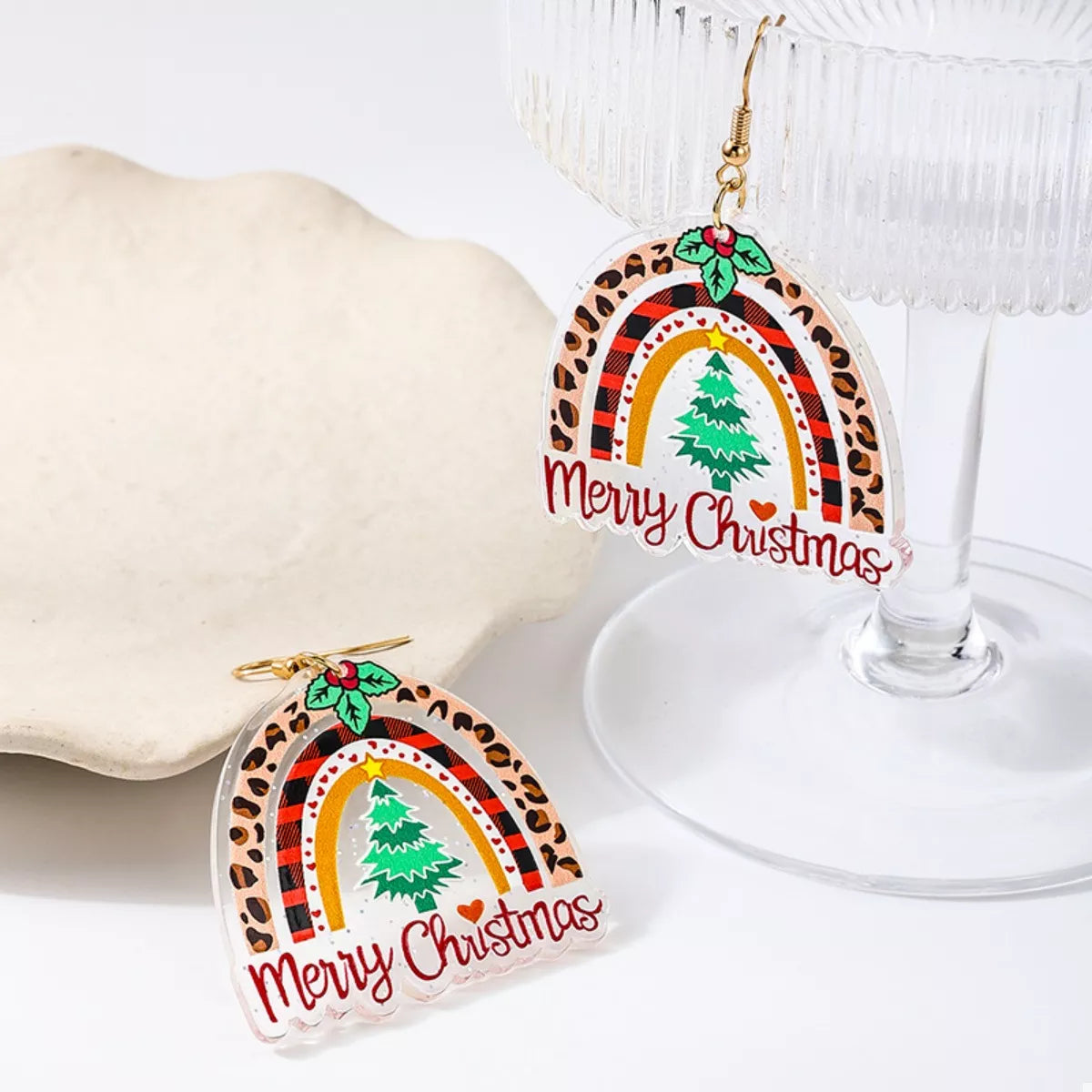 Colorful Christmas rainbow dangle earrings from Plush Fashion Hub, featuring vibrant rainbow design and festive holiday style.