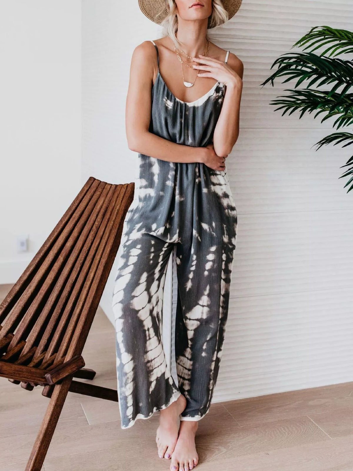 Plus size tie-dye wide leg jumpsuit by Plush Fashion Hub, featuring a colorful, full-length design with a relaxed fit and stylish wide legs.