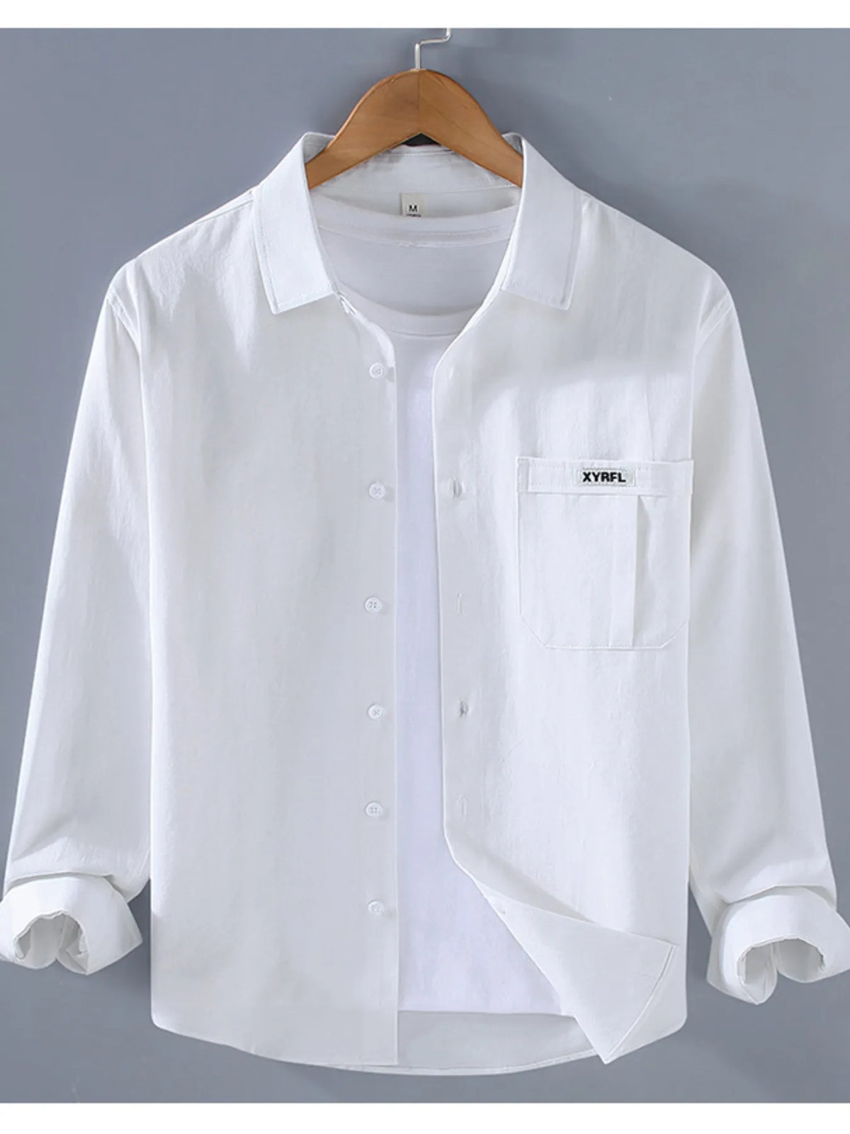 Men's plus size button-up long sleeve shirt from Trendsi, featuring a casual fit and fabric detail.