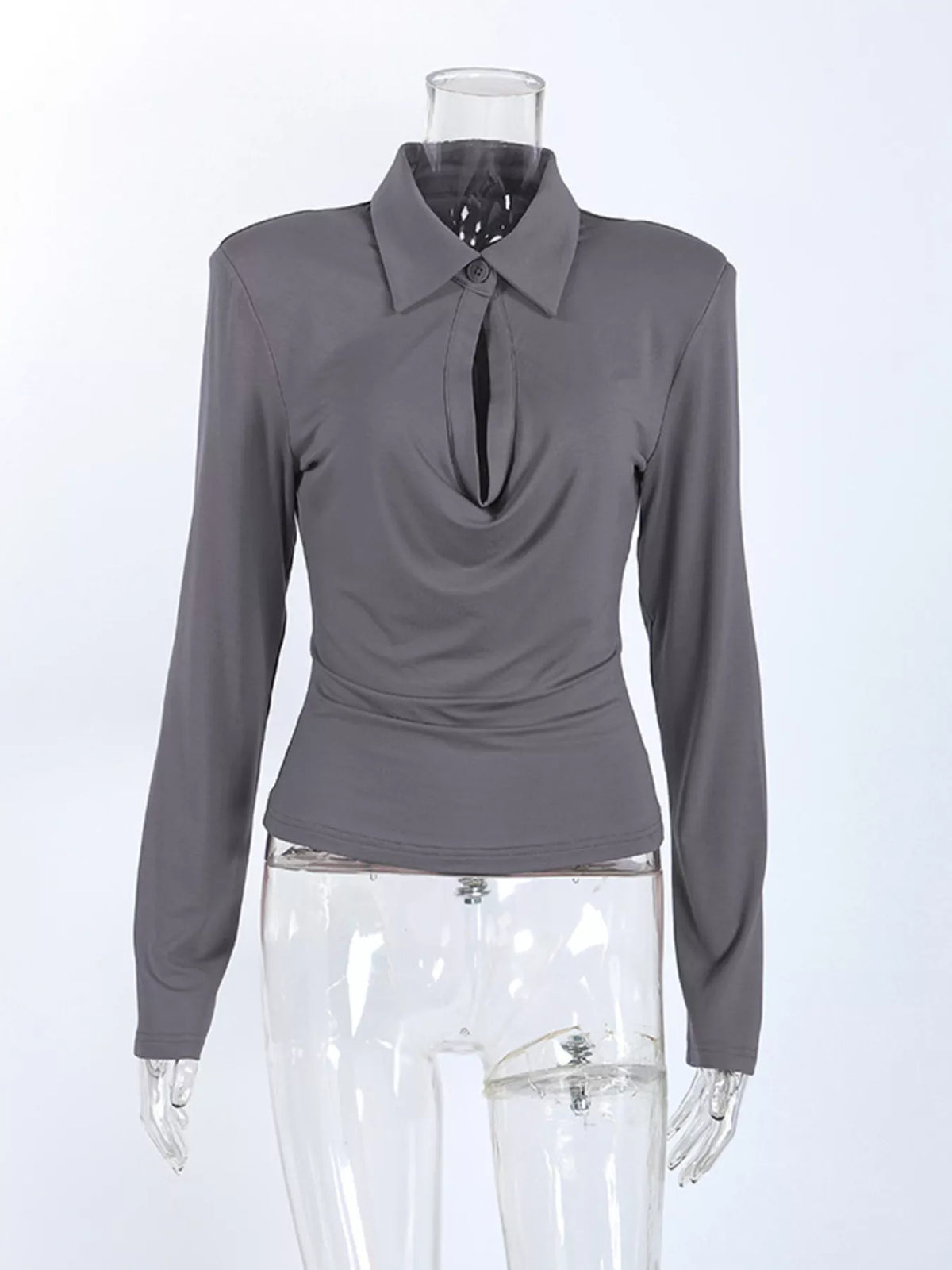 Slim-fit long-sleeve T-shirt with cutout detail from Trendsi, featuring a modern design and flattering fit.