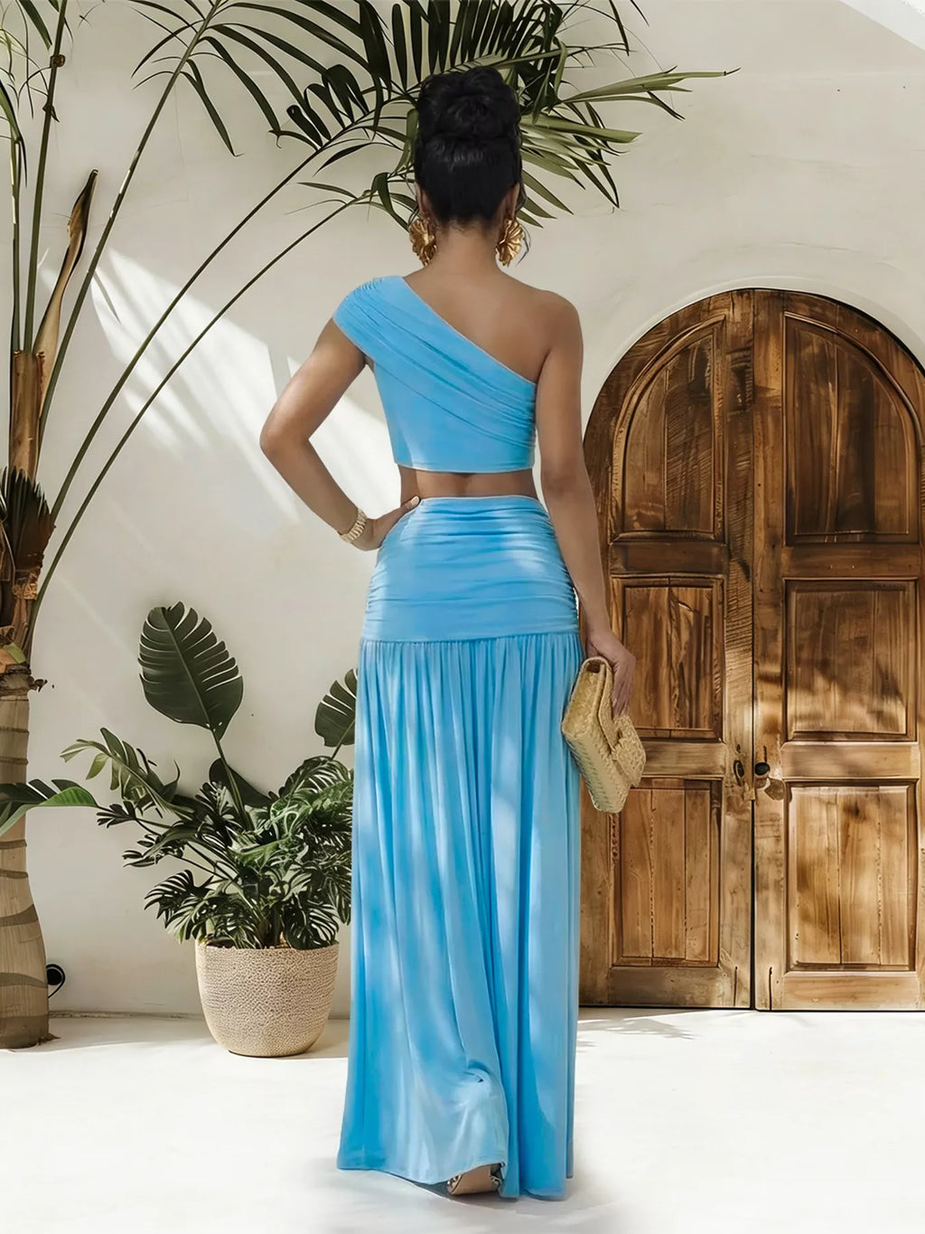 One-shoulder top and ruched maxi skirt set by Trendsi, featuring stylish design and comfortable fit in a coordinated outfit.