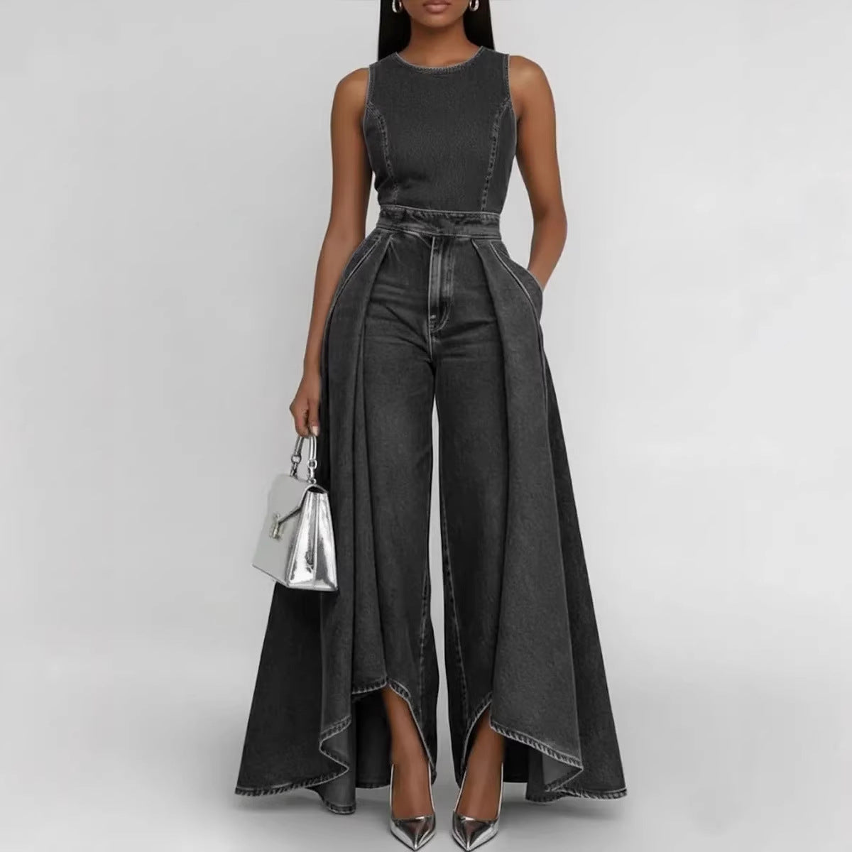 Women’s sleeveless wide-leg denim jumpsuit by FitiqueFit featuring a casual crew neck and relaxed fit, displayed on a model.