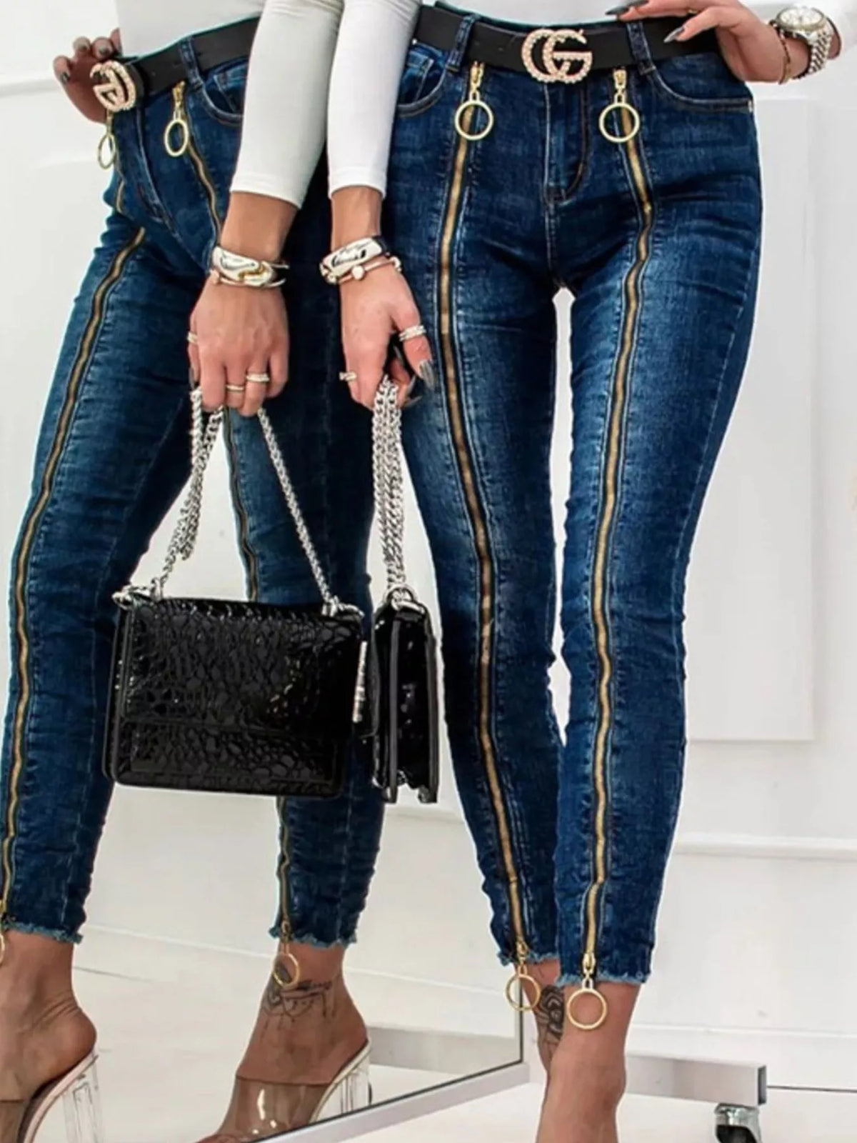 Plush Fashion Hub zipper front skinny jeans displayed on a mannequin, featuring a fitted silhouette and classic denim wash.