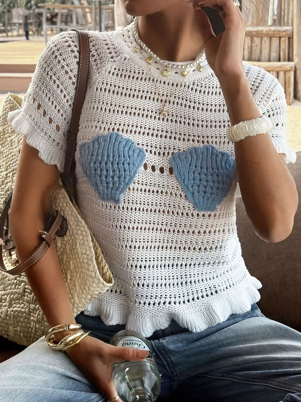 Openwork ruffled hem knit top from Plush Fashion Hub featuring a stylish, lightweight design with intricate openwork and ruffled details.