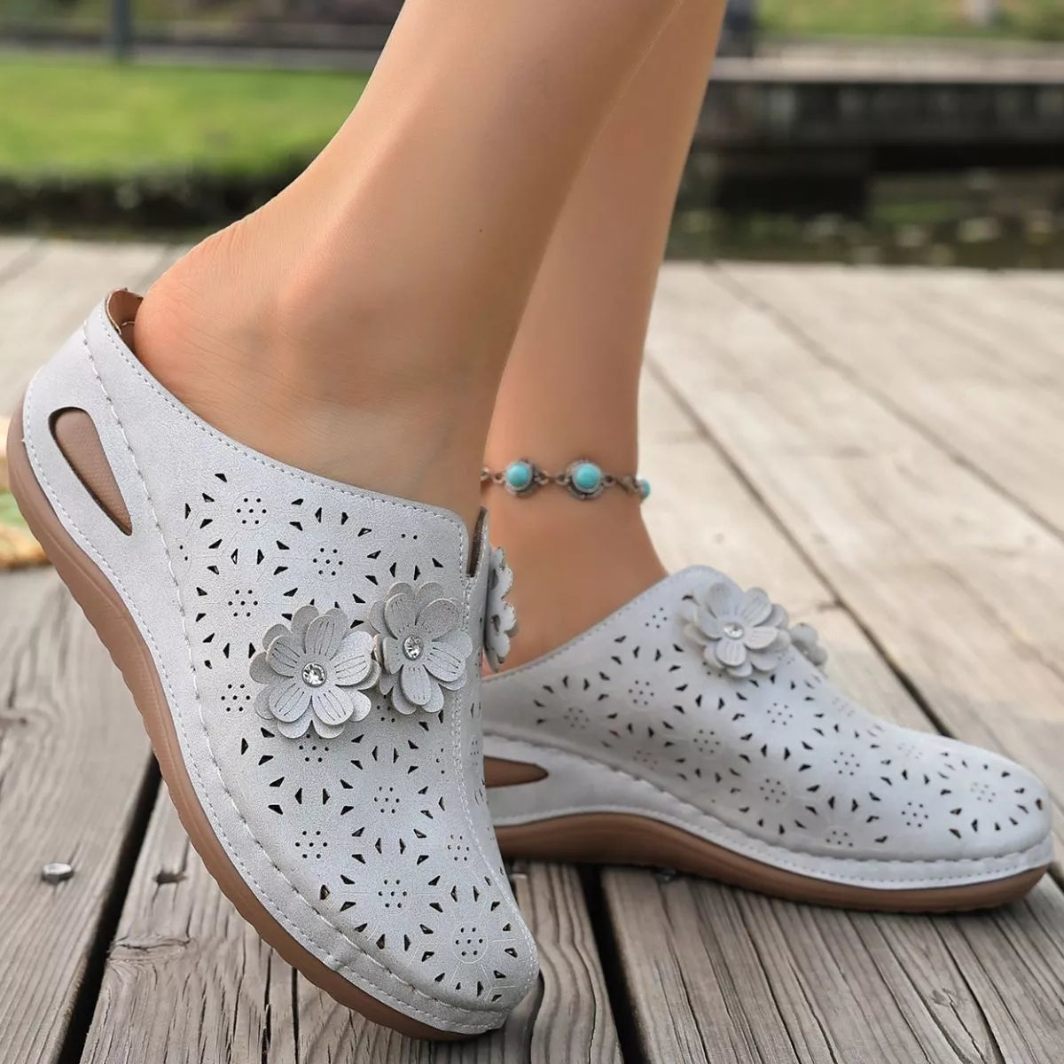 Plush Fashion Hub floral decor round toe sandals with colorful flower embellishments and comfortable straps for summer wear.
