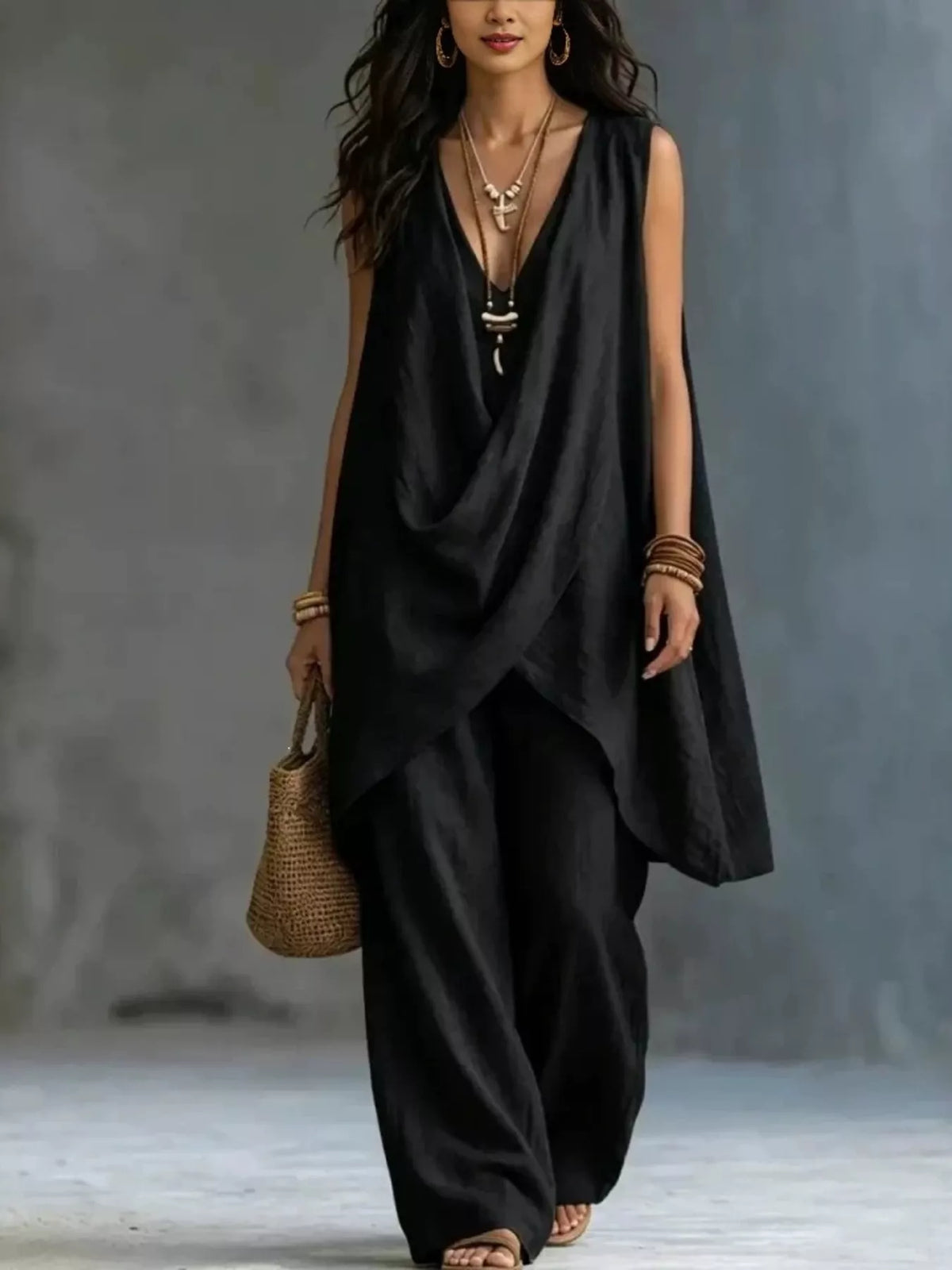 Plush Fashion Hub sleeveless asymmetrical top with wide-leg pants set, featuring a stylish, modern fashion look in soft fabric.