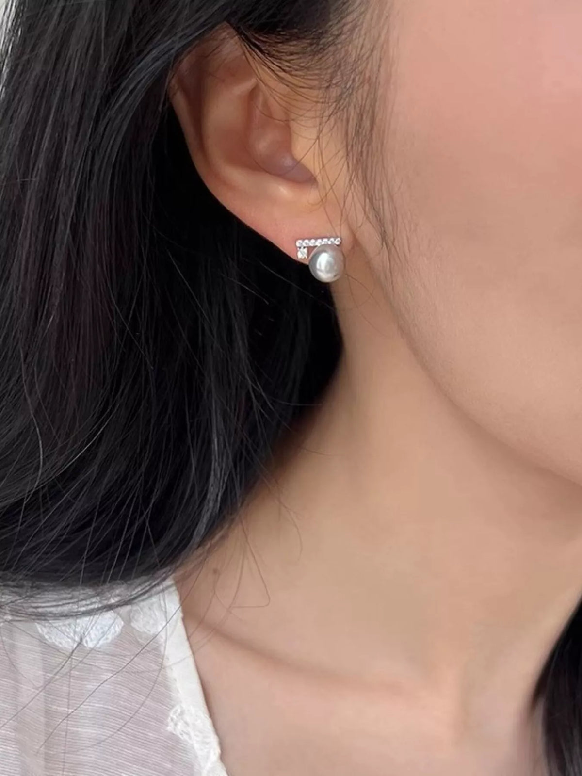 Silver zircon and pearl stud earrings from Plush Fashion Hub featuring elegant jewelry with sparkling stones and smooth pearl accents.