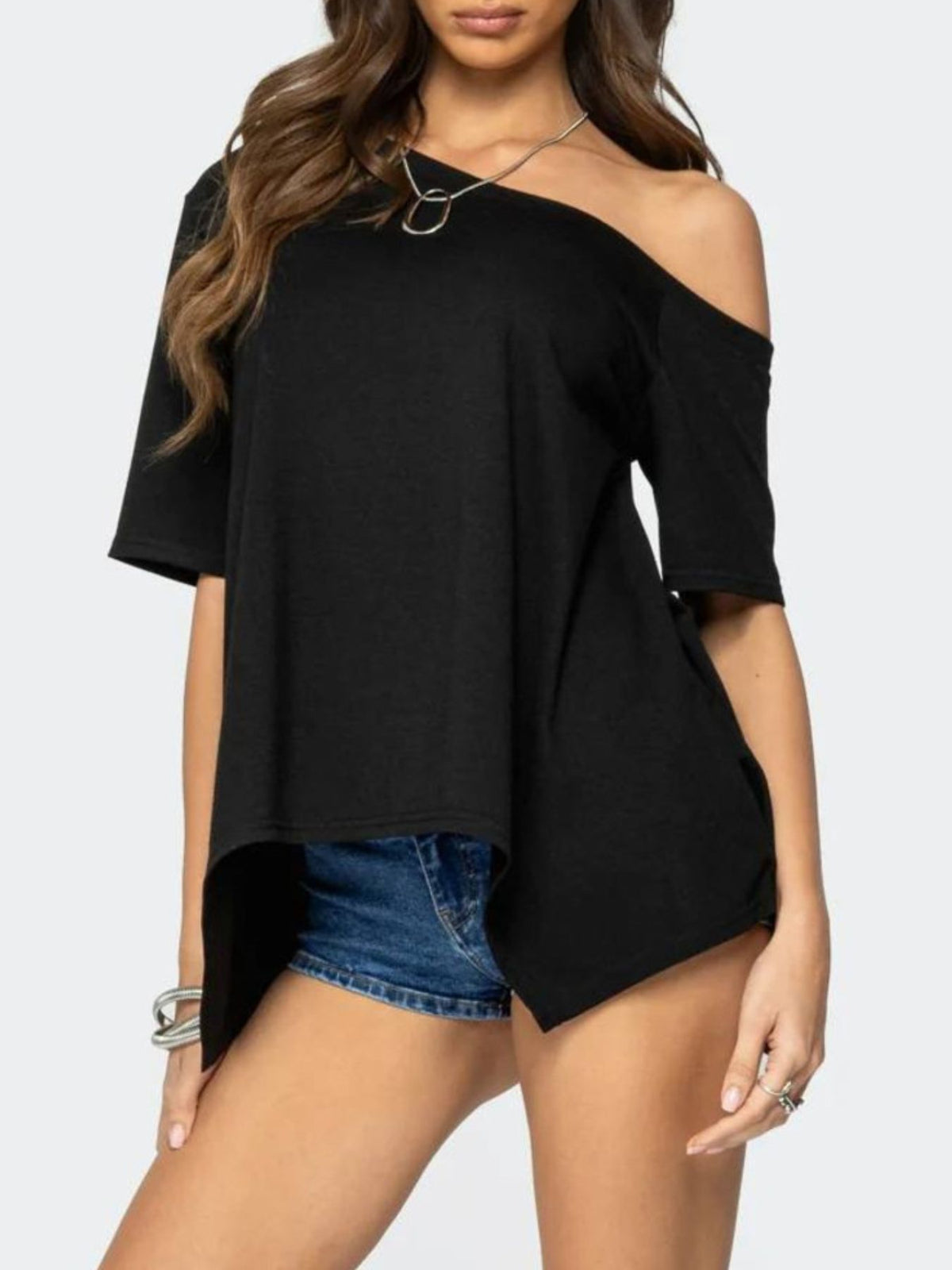 Women's off-shoulder asymmetrical flowy t-shirt by Plush Fashion Hub, featuring a relaxed fit and stylish design.
