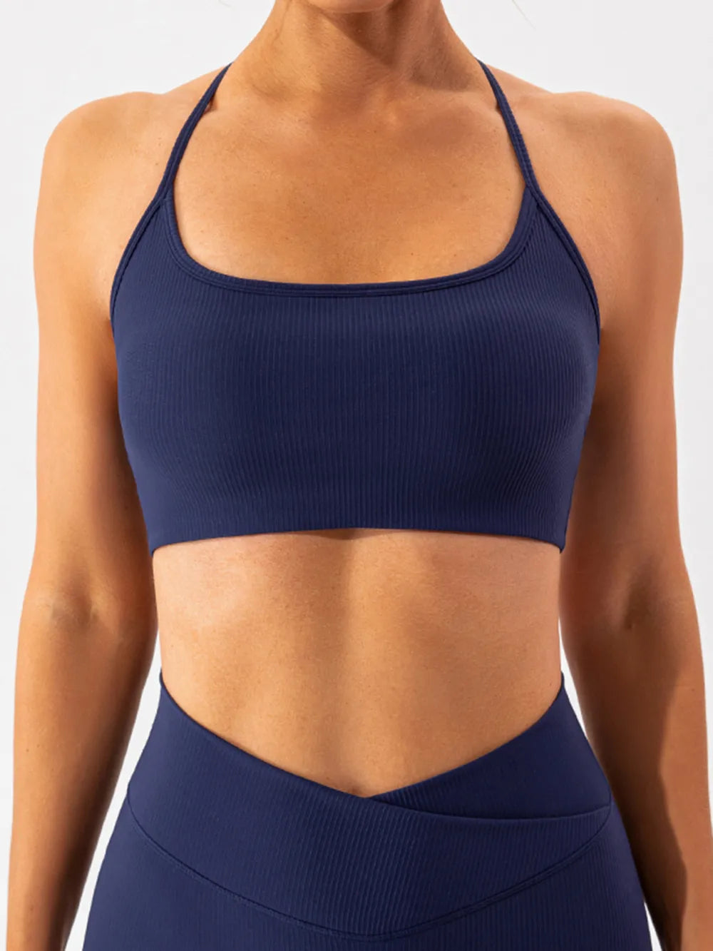 Plush Fashion Hub plush active wear spaghetti strap sports bra with soft fabric and supportive fit for workout or casual wear.