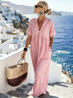 V-neck short-sleeve high waist maxi dress by FitiqueFit, featuring a flowing resort style design in lightweight fabric.