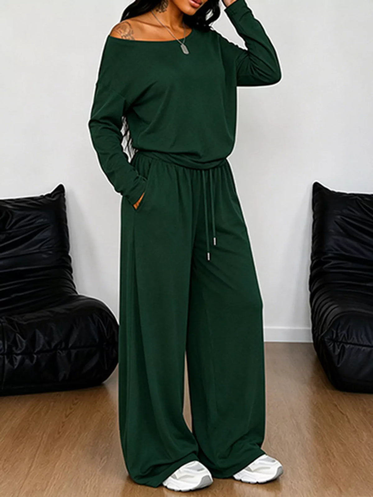 Plus size one-shoulder top and drawstring pants set by Trendsi, stylish matching outfit for plus size women.