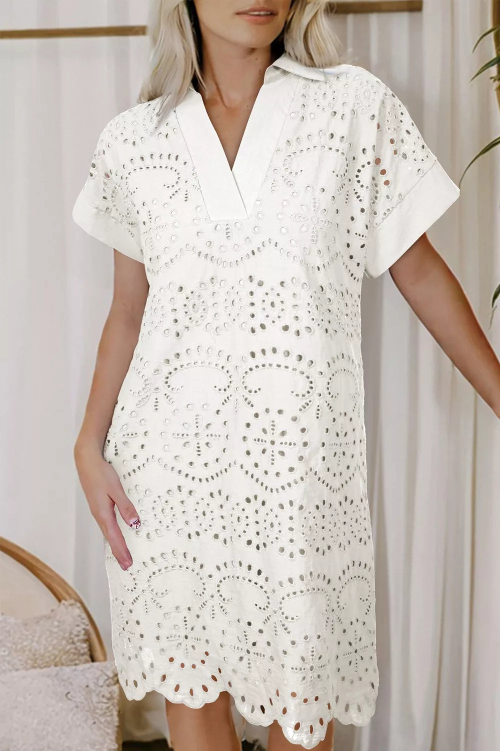 Solid color eyelet embroidered t-shirt mini dress by Plush Fashion Hub, featuring eyelet details and casual fit.