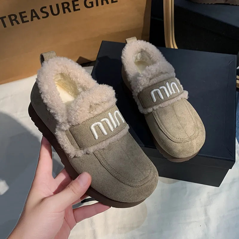 Faux fur suede round toe slip-on shoes by Trendsi, featuring soft lining and stylish casual footwear design.