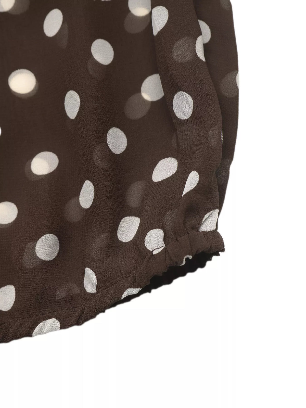 Polka dot mock neck long sleeve blouse from Trendsi featuring a stylish design and classic pattern, perfect for casual or office wear.