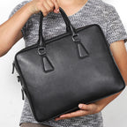 Men's leather briefcase by Pi-Mart, large capacity cowhide handbag with horizontal design and sturdy handles.