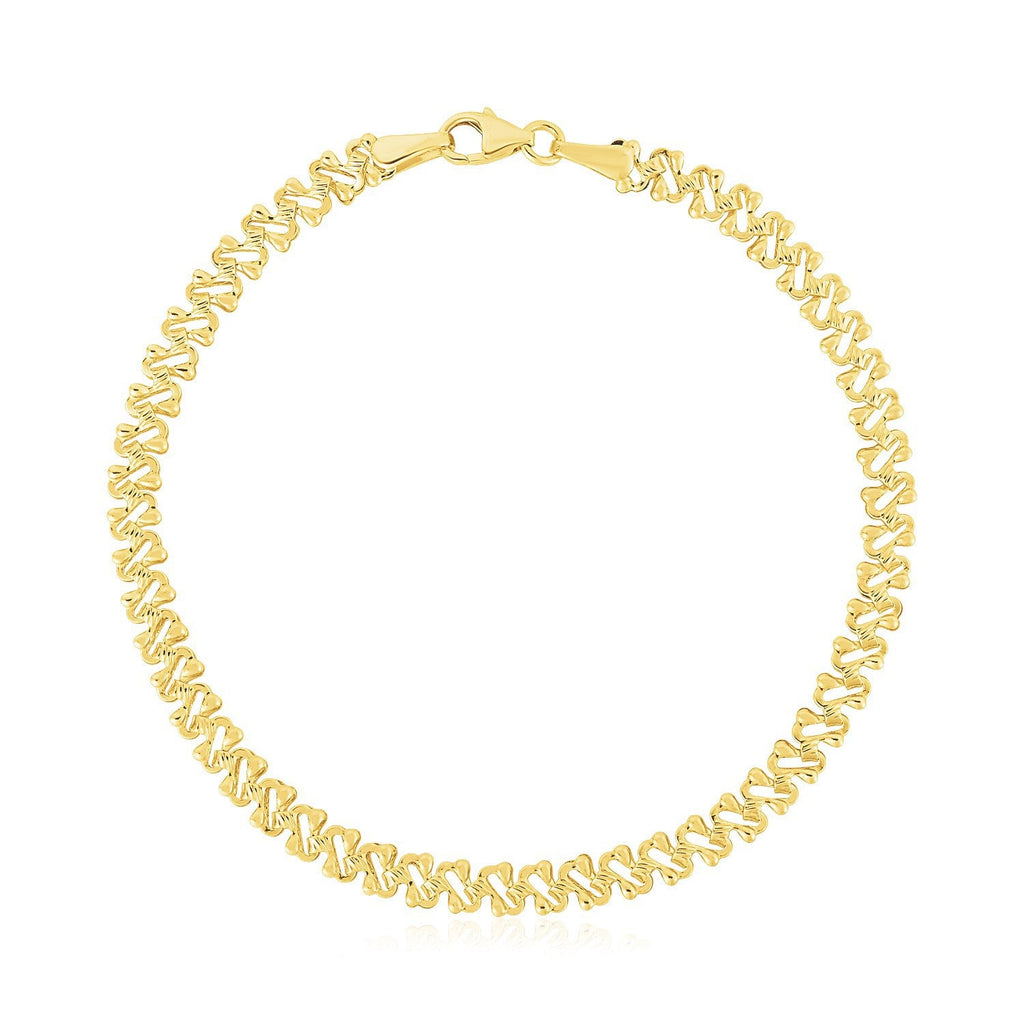 14k yellow gold high polish textured 4mm fancy chain bracelet with intricate design, showcasing luxury jewelry style.