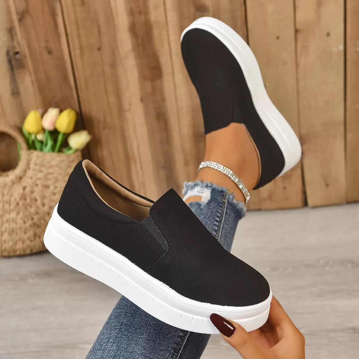 Trendsi round toe platform slip-on footwear with a sleek design, featuring a comfortable, stylish sole and easy slip-on style.