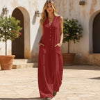 Women's sleeveless wide-leg jumpsuit with pockets by FitiqueFit, casualwear style, shown in light fabric with relaxed fit.