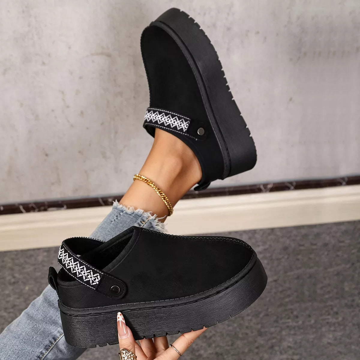Suede fur-lined platform boots with chunky soles, stylish and cozy, perfect for cold weather, by Trendsi.