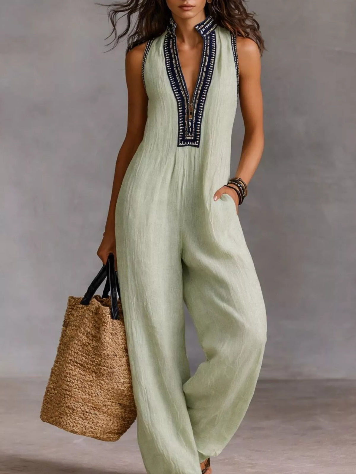 Plus size full length sleeveless wide leg jumpsuit by Trendsi, featuring a stylish, flowing design and comfortable fit.