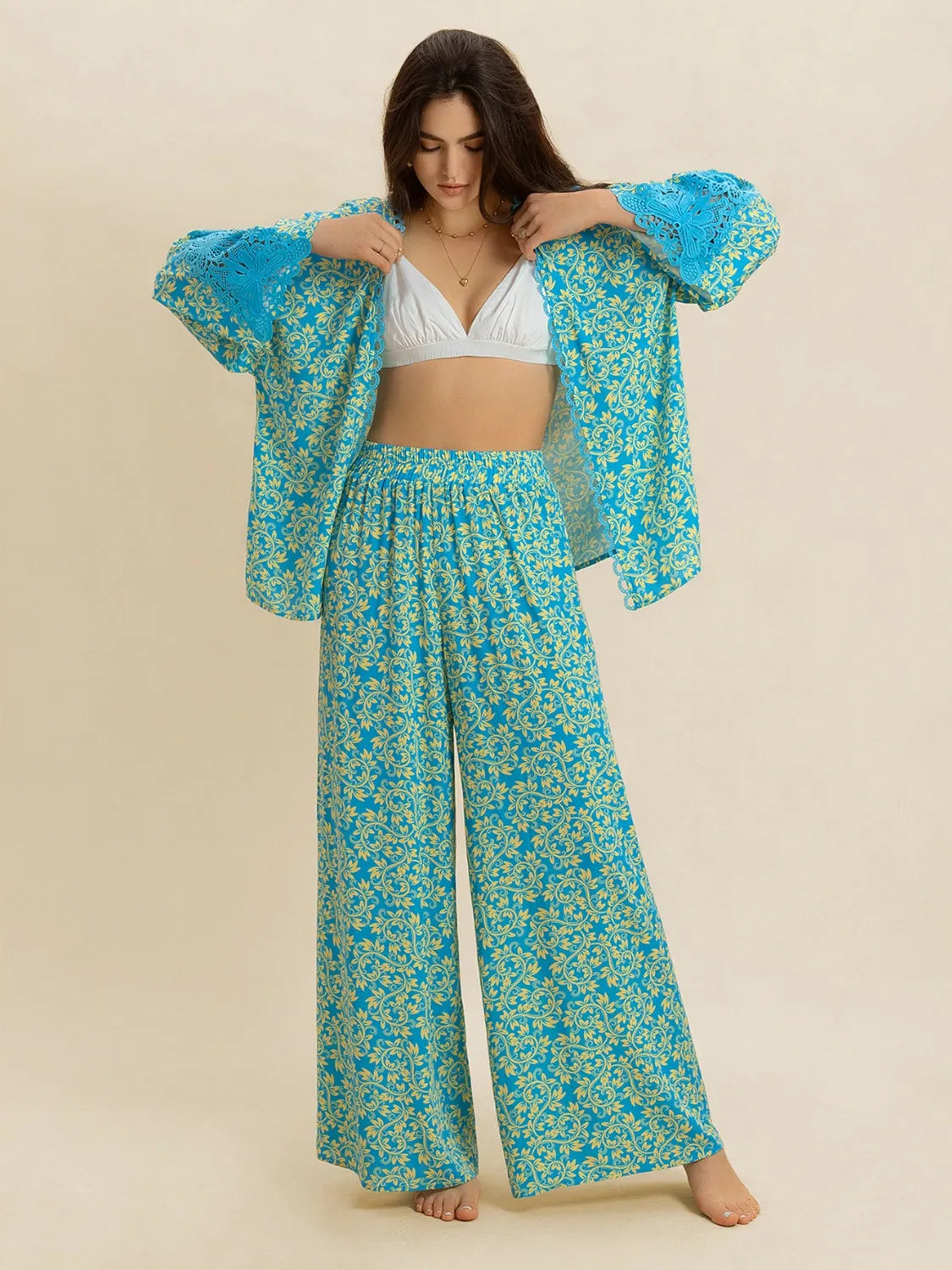 Open front printed matching top and pants set by Plush Fashion Hub, featuring a stylish coordinated outfit with vibrant patterns.